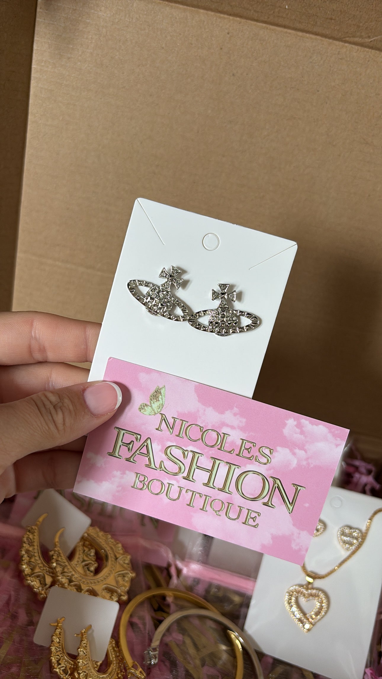 Silver planet earrings with logo